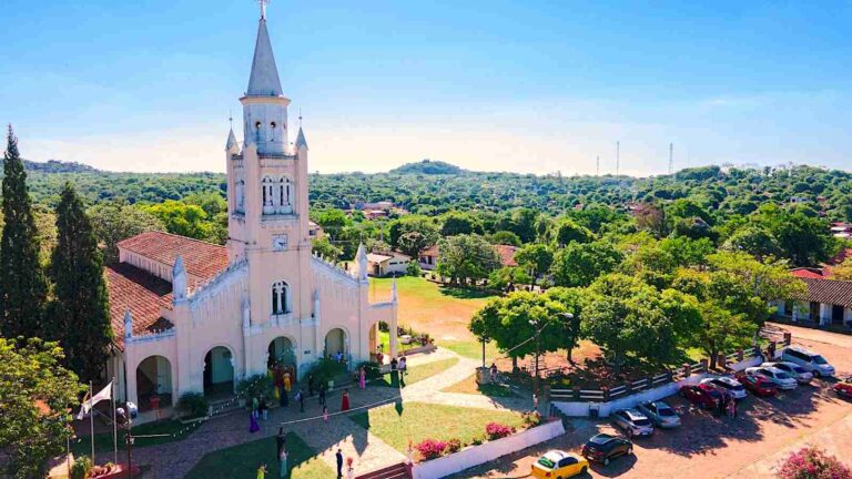 View of the church in the Paraguayan city of Aregua with greenery in the background